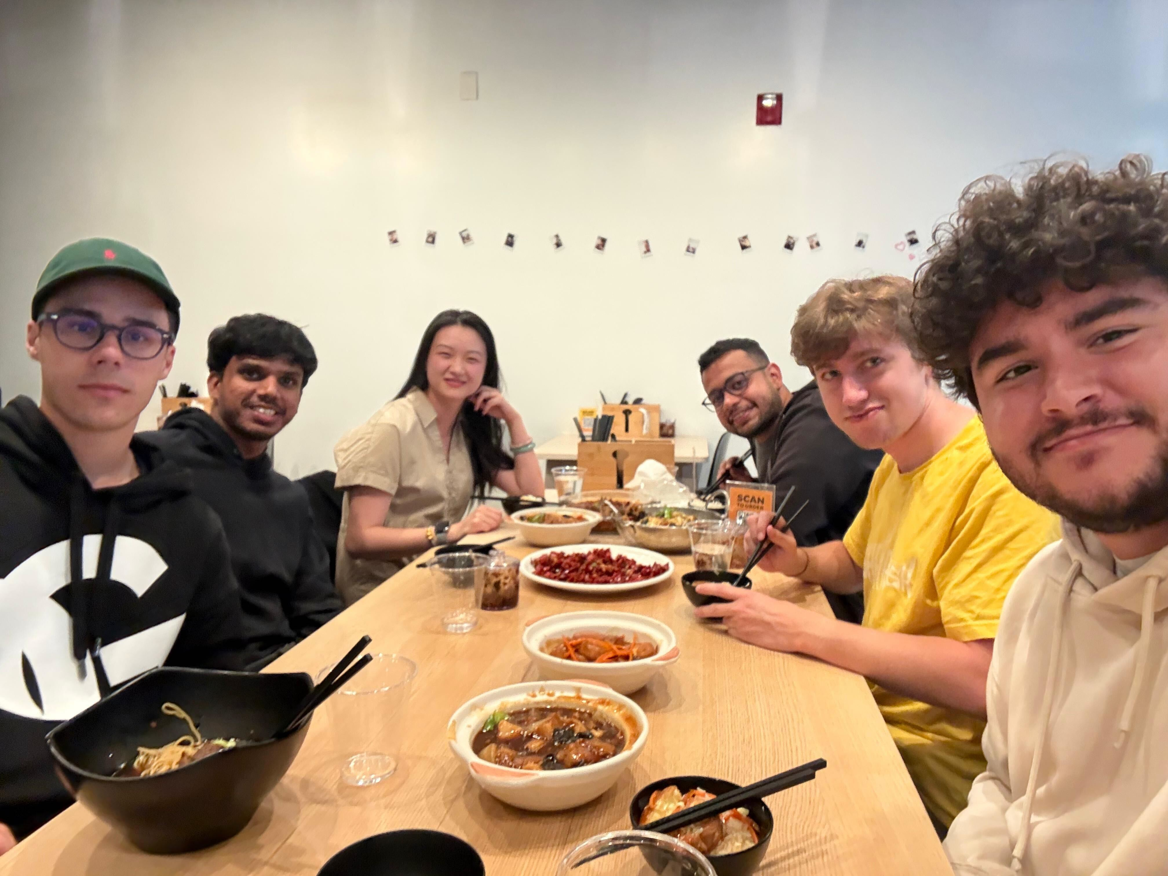 ACTION students over a working dinner